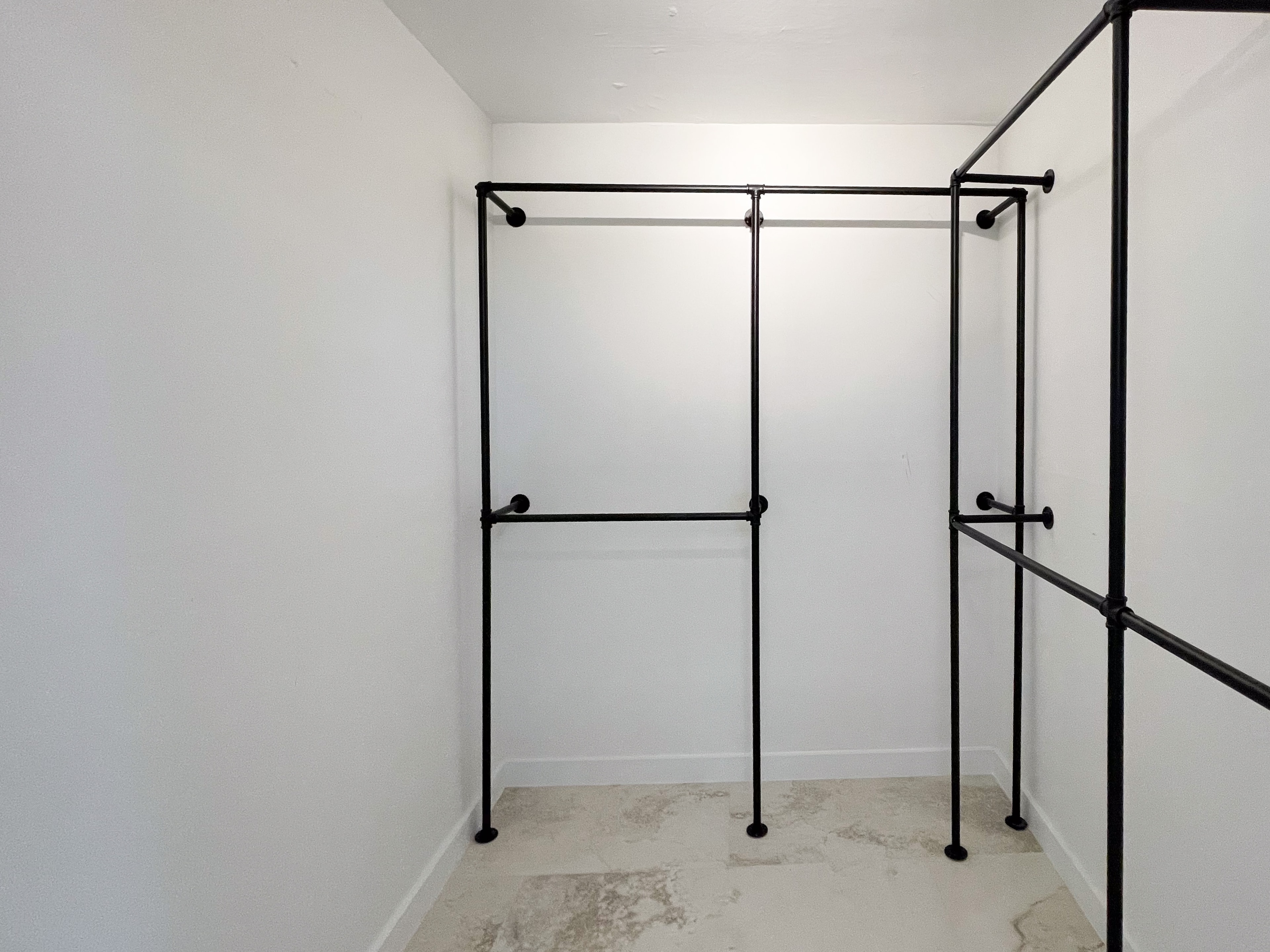 Walk-in closet with double hanging rail system