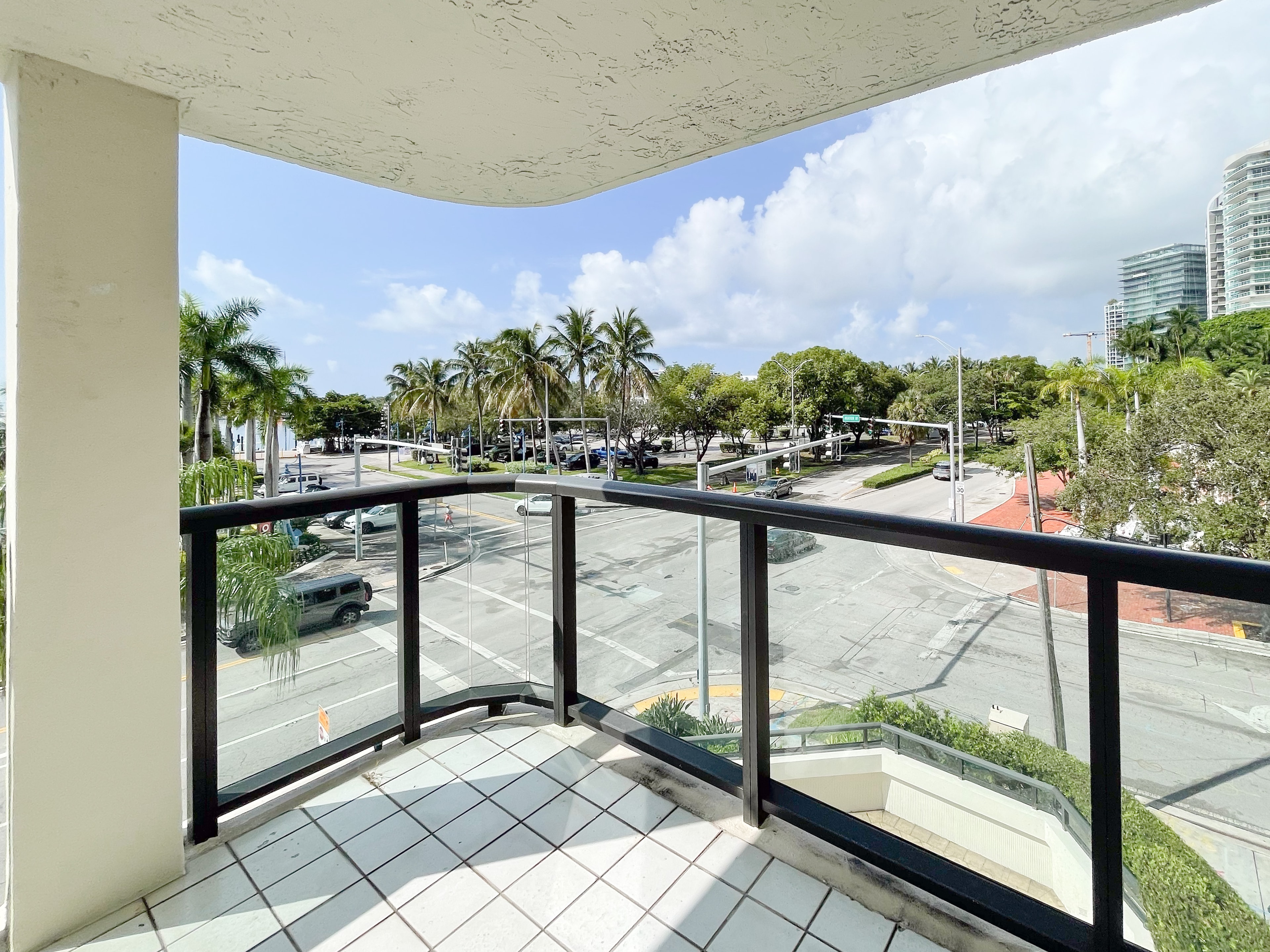 Corner terrace with open intersection and skyline views